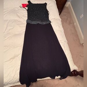 NWT navy formal gown.  Beaded bodice with solid skirt.
